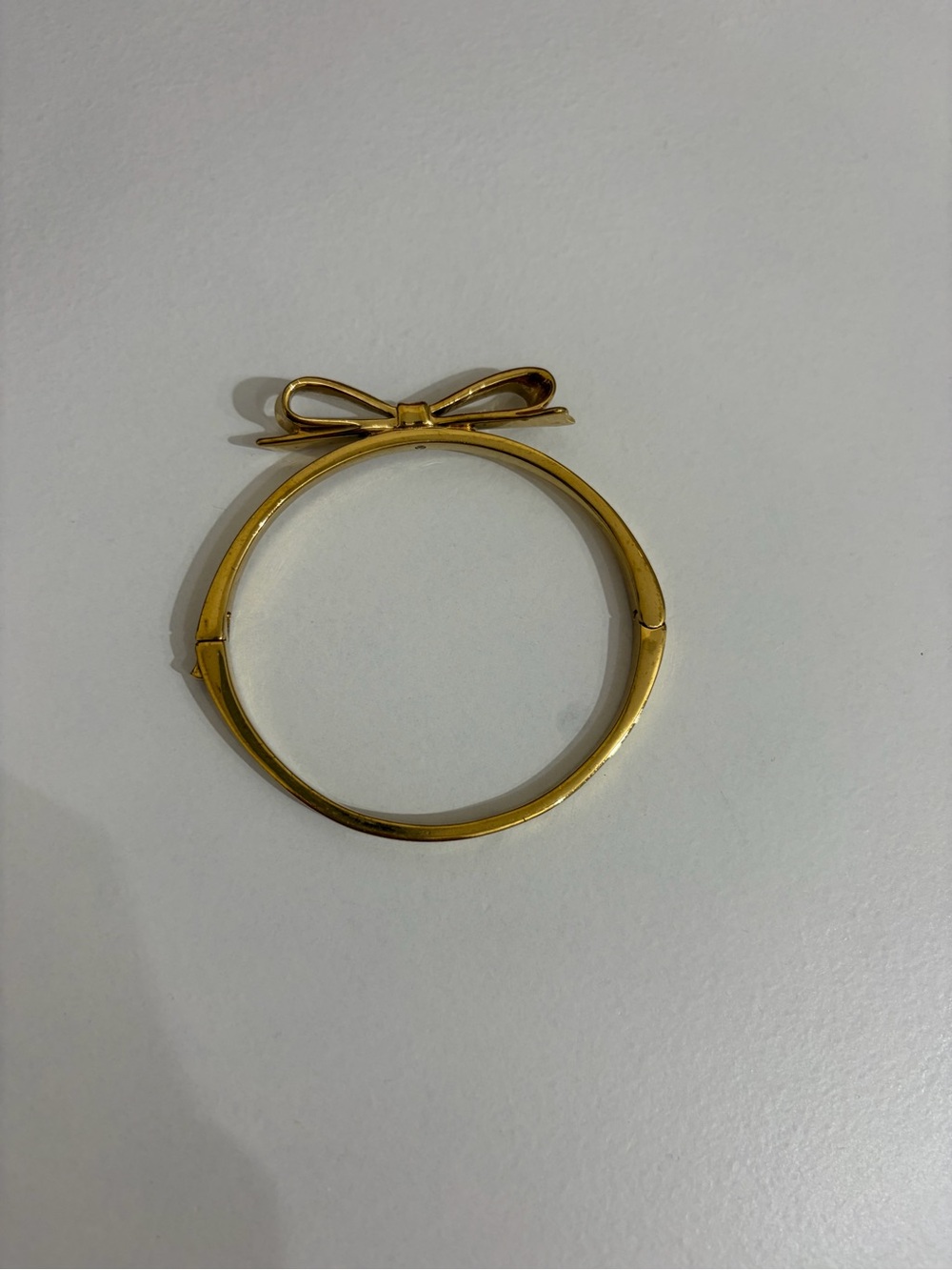kate spade Gold Tone Bow Hinged Bangle Bracelet